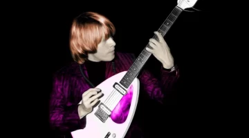 Brian Jones Brian Jones of the Rolling Stones playing guitar